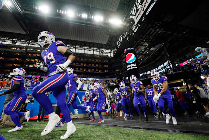 The Bills jog onto the field in Detroit before a game against the Browns